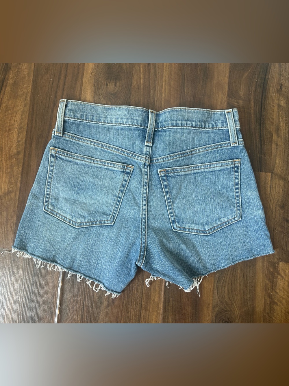 J. Crew Mid Rise Light Wash Raw Hem Denim Shorts | Size 24 - Picture 2 of 7